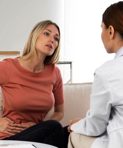 side-view-doctor-talking-woman-.jpg